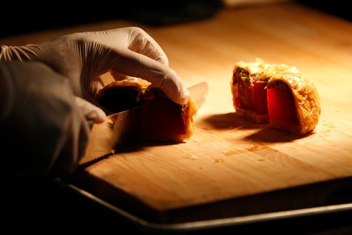 JOHN WOODS / WINNIPEG FREE PRESS
Executive Sous Chef Rain Regalado, St Charles Country Club, prepares Beet Wellington with Shiitake Mushroom Jus at the Siloam Mission Food Fight in the Convention Centre in Winnipeg Tuesday, April 9, 2019. 
 
Reporter: Standup