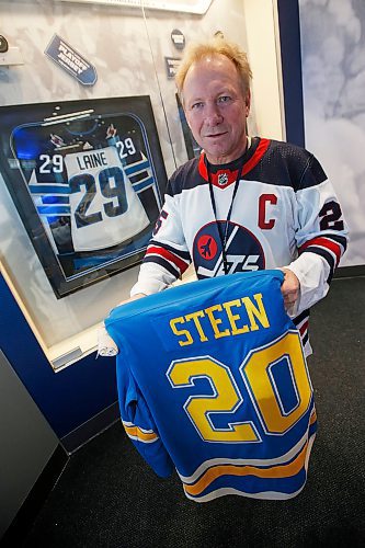 JOHN WOODS / WINNIPEG FREE PRESS
Former Winnipeg Jet Thomas Steen holds his sons St Louis Blues jersey in the Winnipeg Jets arena in Winnipeg Tuesday, April 9, 2019. Steen is torn in his allegiance.
 
Reporter: Bell