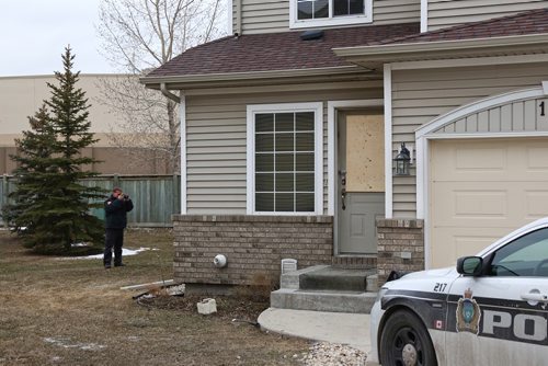 MIKE DEAL / WINNIPEG FREE PRESS
Winnipeg Fire Investigators arrive at the scene of a fatal fire in a townhome condominium complex in the 700 block of Dovercourt Drive Wednesday morning. 
190410 - Wednesday, April 10, 2019