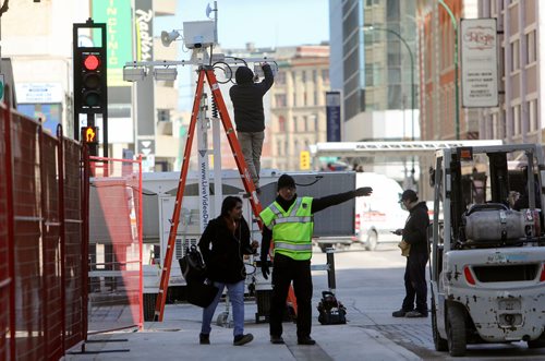 RUTH BONNEVILLE / WINNIPEG FREE PRESS 

Crews set up speaker systems, fencing and redirect foot traffic along Hargrave at Smith Street as they prep for Whiteout party on Wednesday.



April 10, 2019