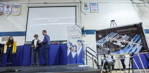 MIKE DEAL / WINNIPEG FREE PRESS
Student Carter Mansell reads his question, "What is your favourite feature of Earth from space?" to astronaut David Saint-Jacques who is on the International Space Station Wednesday morning.
As part of the Amateur Radio on the International Space Station (ARISS) program, Canadian Space Agency (CSA) astronaut David Saint-Jacques connected with Grade 9 students at Shaftsbury High School and answered their questions live from the International Space Station (ISS).
190410 - Wednesday, April 10, 2019.