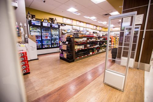 MIKAELA MACKENZIE / WINNIPEG FREE PRESS
Active alarm pedestals, an example of the new theft prevention measures, at the St. James Superstore Liquor Mart in Winnipeg on Wednesday, April 10, 2019. 
Winnipeg Free Press 2019.