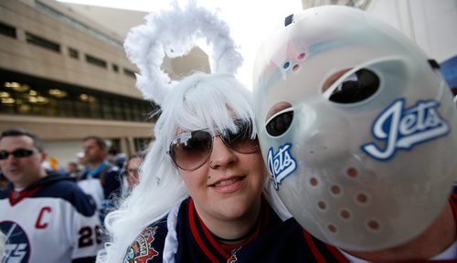 PHIL HOSSACK / WINNIPEG FREE PRESS -  Shawn and Laura Aseltine got all dressed up for the'Ball' aka Jets whiteout street party on Donald Street venue Wednesday. See story. - April 10, 2019.