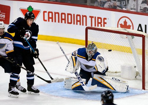 PHIL HOSSACK / WINNIPEG FREE PRESS -  St Louis Blues net minder #50 Jordan Binnington doesn't even see Patric Laine's shot coming in the first period, #9 Andrew Copp follows it in. First Round of the Western Conference Quarter Final Wednesday in Winnipeg. See story. - April 10, 2019.