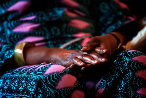 PHIL HOSSACK / WINNIPEG FREE PRESS - Louise-Marie Akiki's hands express a growing calmness as she sits in her St Boniface apartment. There is a darkness that never leaves her eyes. See Carol Sanders story. - April 11, 2019.