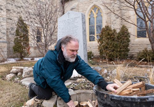 SASHA SEFTER / WINNIPEG FREE PRESS
FAITH - Reverend Paul Johnson of St. John's Cathedral sets up wood in a stone circle in preparation for the upcoming Easter fire.
190412 - Friday, April 12, 2019.