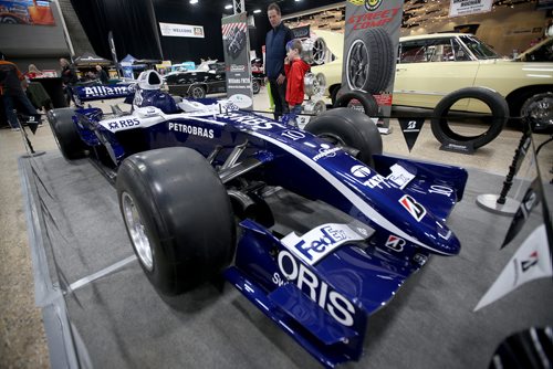 TREVOR HAGAN / WINNIPEG FREE PRESS
Doug Rapko and his son, Zayne, 7, check out a Formula 1 car used by Nico Rosberg in the 2006 season at the World of Wheels car show at the Convention Centre, Friday, April 12, 2019.