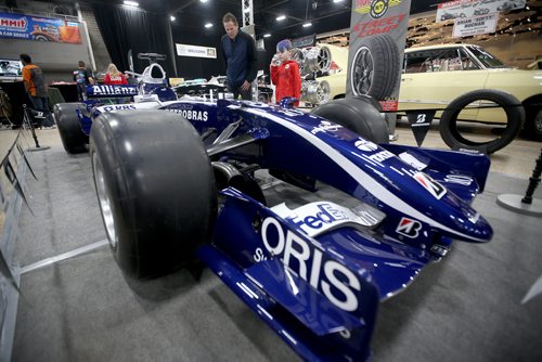 TREVOR HAGAN / WINNIPEG FREE PRESS
Doug Rapko and his son, Zayne, 7, check out a Formula 1 car used by Nico Rosberg in the 2006 season at the World of Wheels car show at the Convention Centre, Friday, April 12, 2019.