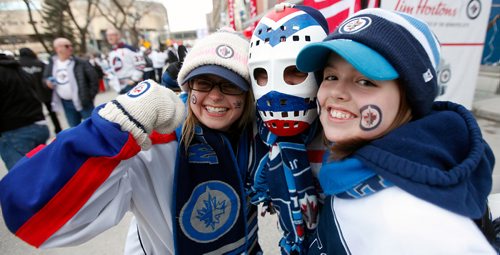 PHIL HOSSACK / WINNIPEG FREE PRESS - WHITE OUT PARTY- left to right Corrine, Bart and Abby Weidman made the trip in from Bousejour Friday. See Alex Paul's story. - April 12, 2019.