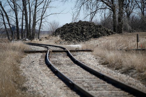 JOHN WOODS / WINNIPEG FREE PRESS
Emerson is preparing to push mud over a train track to close a dike along the Canada/US border in expectation of high water Sunday, April 14, 2019.

Reporter: Redekop