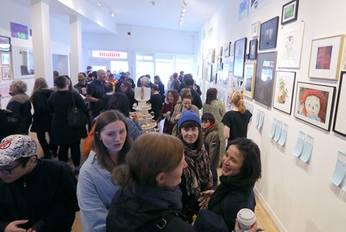 JASON HALSTEAD / WINNIPEG FREE PRESS

Attendees check out the art at the Mentoring Artists for Womens Art (MAWA) annual Over the Top Art Auction and Cupcake Party on March 17, 2019 at MAWA's storefront space on Main Street. (See Social Page)