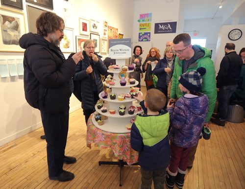 JASON HALSTEAD / WINNIPEG FREE PRESS

Attendees check out the cupcake selection at the Mentoring Artists for Womens Art (MAWA) annual Over the Top Art Auction and Cupcake Party on March 17, 2019 at MAWA's storefront space on Main Street. (See Social Page)