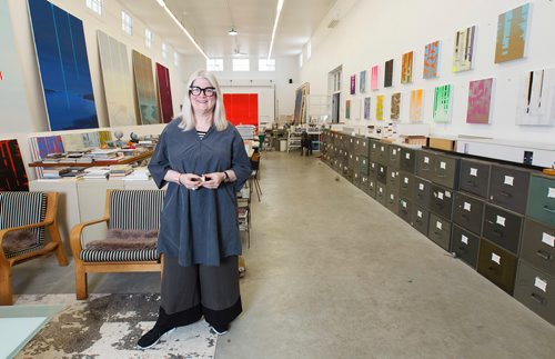 MIKE DEAL / WINNIPEG FREE PRESS
Artist Wanda Koop in her Winnipeg Studio with one of the ten sketch books she carried with her that she filled with drawings of the Notre Dame Cathedral during her six-month Canada Council Paris Studio trip.
190416 - Tuesday, April 16, 2019.