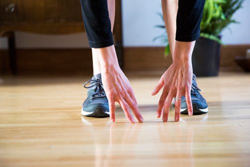 MIKAELA MACKENZIE/WINNIPEG FREE PRESS
Avid runner Sylvia Buchholz does a sun salutation before running to work in Winnipeg on Wednesday, April 17, 2019. 
Winnipeg Free Press 2019