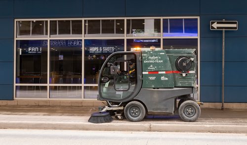 SASHA SEFTER / WINNIPEG FREE PRESS
District Operator Leslie Hennessy of Downtown BIZ's Enviro Team uses a sidewalk sweeper to clean up Hargrave Street just south of Portage Avenue in downtown Winnipeg. See Declan Schroeder story.
190417 - Wednesday, April 17, 2019.