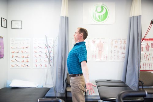 MIKAELA MACKENZIE/WINNIPEG FREE PRESS
Physiotherapist Gilbert Magne demonstrates Brugger's stretch at Precision Movement & Therapies clinic in Winnipeg on Thursday, April 18, 2019. 
Winnipeg Free Press 2019
