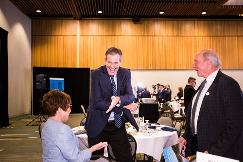 MIKAELA MACKENZIE/WINNIPEG FREE PRESS
Premier Brian Pallister talks with Brigette Sandron, senior vice president of Travel Manitoba (left) and Colin Ferguson, president and CEO of Travel Manitoba, at a Chamber of Commerce event at the RBC Convention Centre in Winnipeg on Thursday, April 18, 2019. 
Winnipeg Free Press 2019