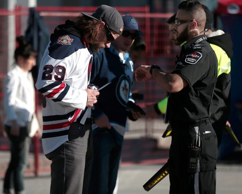 PHIL HOSSACK / WINNIPEG FREE PRESS - Party  goes searched at the gates Thursday as fans arrived for festivities. - April 18, 2019.