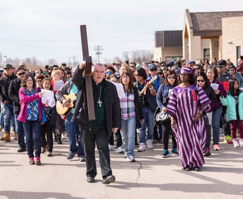 SASHA SEFTER / WINNIPEG FREE PRESS
Archbishop Richard Gagnon leads the Way of the Cross from the Good Shepherd Roman Catholic Church in Portage La Prairie.
190419 - Friday, April 19, 2019.