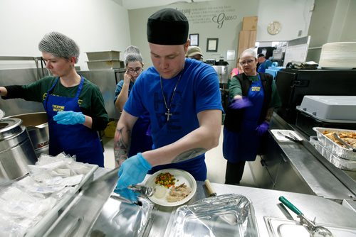 PHIL HOSSACK / WINNIPEG FREE PRESS - Staff prep a turkey dinner for 300 plus 'patrons' at the LightHouse Mission on Main street for a traditional Good Friday holiday meal. See release.  - April 19, 2019.