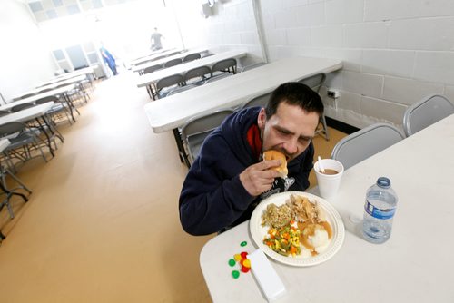 PHIL HOSSACK / WINNIPEG FREE PRESS - Kenny Canard gets a head start as the doors open for 300 plus 'patrons' at the LightHouse Mission on Main street for a traditional Good Friday holiday meal. See release.  - April 19, 2019.