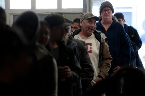 PHIL HOSSACK / WINNIPEG FREE PRESS -  300 plus 'patrons' line up at the LightHouse Mission on Main street for a traditional Good Friday holiday meal. See release.  - April 19, 2019.