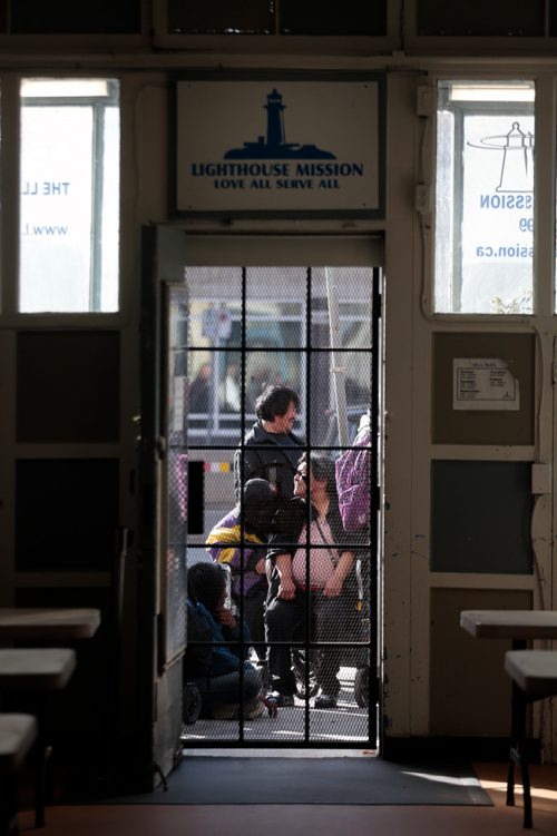 PHIL HOSSACK / WINNIPEG FREE PRESS - 'Patrons' wait outside the LightHouse Soup Kitchen Good Friday evening waiting for a traditional holiday meal. See release.  - April 19, 2019.