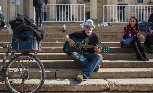 MIKE DEAL / WINNIPEG FREE PRESS
Jack D Zastre plays his guitar during the first 4/20 celebration since cannabis was legalized happened on the grounds of the Manitoba legislature Saturday.
190420 - Saturday, April 20, 2019.