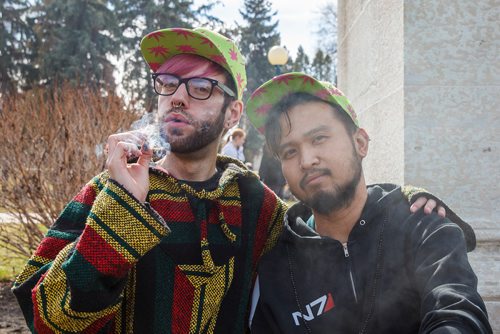 MIKE DEAL / WINNIPEG FREE PRESS
Matthew Wood (left) and Anthony Abrena (right) during the first 4/20 celebration since cannabis was legalized happened on the grounds of the Manitoba legislature Saturday.
190420 - Saturday, April 20, 2019.