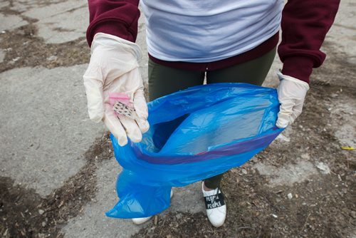 MIKE DEAL / WINNIPEG FREE PRESS
Victoria Preston along with other members of the River City Bud Co clean up the area around Prichard Avenue and Salter Street Saturday afternoon during a BBQ for the community. 
190420 - Saturday, April 20, 2019.
