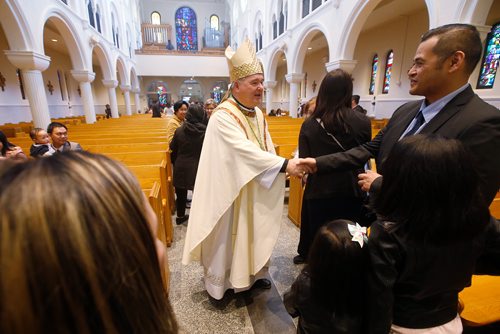JOHN WOODS / WINNIPEG FREE PRESS
Archbishop of Winnipeg Richard Gagnon greets parishioners after an Easter Mass at St Marys Cathedral in Winnipeg Easter Sunday, April 21, 2019.

Reporter: Rollason