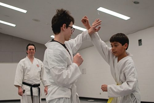 Canstar Community News Students Austin Schwartz and Aahron Coward spar during a Chito-Ryu Winnipeg karate class at Roblin Park Community Centre. (EVA WASNEY/CANSTAR COMMUNITY NEWS/METRO)