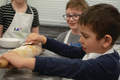 Canstar Community News Sammy McFee rolls dough during Westdale Community Centre's Kids in the Kitchen program. (EVA WASNEY/CANSTAR COMMUNITY NEWS/METRO)