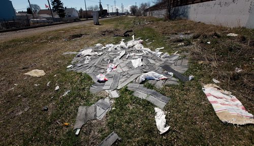 PHIL HOSSACK / WINNIPEG FREE PRESS - Illegal dumping trash in Weston along back lane between Bannatyne and McDermott. See story. . - April 22, 2019.