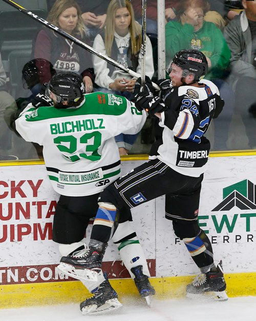JOHN WOODS / WINNIPEG FREE PRESS
Portage Terriers' Jay Buchholz (23) and Swan Valley Stampeders' Dane Hirst (24) collide during the first period of game seven MJHL Turnbull Cup action in Portage La Prairie on Monday, April 22, 2018.

Reporter: