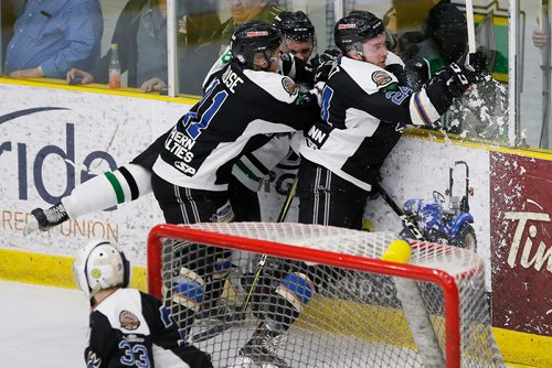 JOHN WOODS / WINNIPEG FREE PRESS
Portage Terriers' Kolton Shindle (18) gets checked by Swan Valley Stampeders' Kasyn Kruse (11) and Dane Hirst (24) during the first period of game seven MJHL Turnbull Cup action in Portage La Prairie on Monday, April 22, 2018.

Reporter: