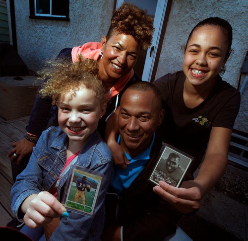 PHIL HOSSACK / WINNIPEG FREE PRESS - Blue Bomber inductee Ernie Pitts' and grandkids pose Wednesday with Player Cards of their father and grandfather. rather and sister Wanda Guenette (left rear) and Ernie Foort and his daughters (Ernie Pitts grandkids) Ocean (left) and Autumn. -  See Mike Sawatzky story.  - April 23, 2019.