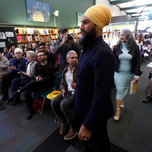 PHIL HOSSACK / WINNIPEG FREE PRESS - Jagmeet Singh and Nahanni Fontaine enter the McNally Robinson 'atrium' to launch his new book, "Love and Courage" Thursday afternoon. See Bill Redekopp story. - April 25, 2019.