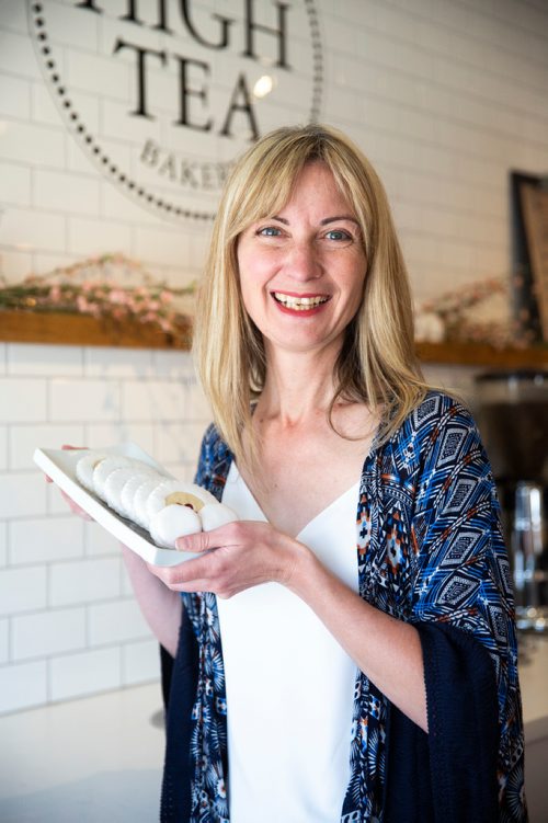 MIKAELA MACKENZIE/WINNIPEG FREE PRESS
Belinda Bigold, owner of High Tea, poses for a portrait with her Imperial cookies in Winnipeg on Thursday, April 25, 2019. For Dave Sanderson story.
Winnipeg Free Press 2019