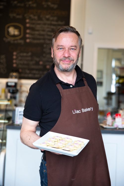 MIKAELA MACKENZIE/WINNIPEG FREE PRESS
Owner Christopher Atkinson poses with his Imperial cookies at Lilac Bakery in Winnipeg on Thursday, April 25, 2019. For Dave Sanderson story.
Winnipeg Free Press 2019
