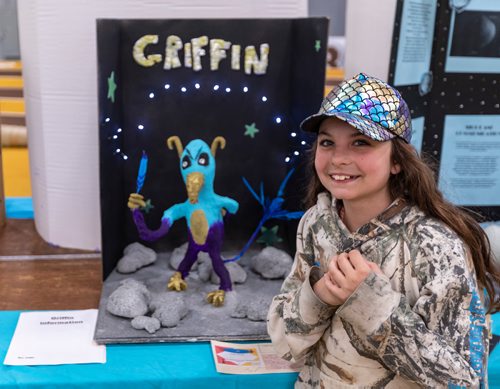 SASHA SEFTER / WINNIPEG FREE PRESS
George Johnson Middle School grade five student Sage Closen (11) shows off her own alien creation at the Manitoba Schools Science Symposium which is being held in the Max Bell Centre on the University of Manitoba campus.
190426 - Friday, April 26, 2019.