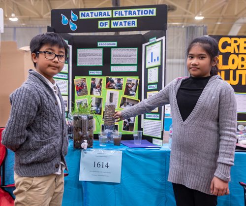 SASHA SEFTER / WINNIPEG FREE PRESS
Grade five students Kevin Filart (10) and Seffa Diongson (10) show off their water filtration project at the Manitoba Schools Science Symposium in the Max Bell Centre on the University of Manitoba campus.
190426 - Friday, April 26, 2019.