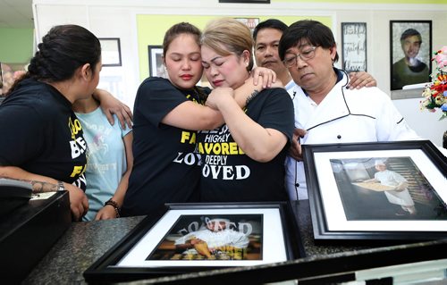 RUTH BONNEVILLE / WINNIPEG FREE PRESS 


Local, Adao Family at  Jimel's Bakery at  660 Sheppard St. location.


Emotional Photo of Imelda and Jaime Sr. Adao whose son Jaime, 17 was killed on March 3 in a violent home invasion with their family at their bakery with photos of Jaime with them.


Photo of Adao family: Imelda and Jaime, Sr. Adao and their other children:  Michael (rear, right),  Germelyn (left), Emerald (next to mom) and Jaime Junior's niece, Kristlyn Cain Parayno (lblue youngest, granddaughter to Imelda and Jaime Sr). 


More info:  The five children have come from the Phillipines and will stay 6 months with their parents to help in the two bakeries.

Other siblings not available to be in photo.



Ashley Prest  | Reporter

April 26, 2019