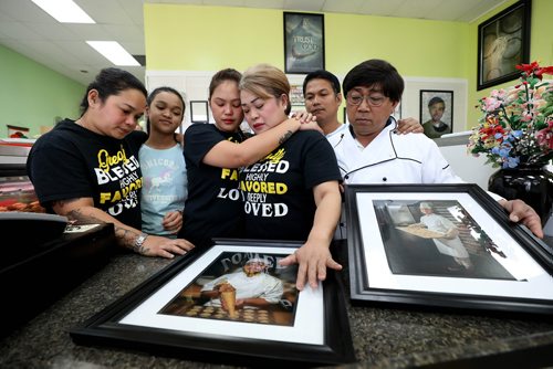 RUTH BONNEVILLE / WINNIPEG FREE PRESS 


Local, Adao Family at  Jimel's Bakery at  660 Sheppard St. location.


Emotional Photo of Imelda and Jaime Sr. Adao whose son Jaime, 17 was killed on March 3 in a violent home invasion with their family at their bakery with photos of Jaime with them.


Photo of Adao family: Imelda and Jaime, Sr. Adao and their other children:  Michael (rear, right),  Germelyn (left), Emerald (next to mom) and Jaime Junior's niece, Kristlyn Cain Parayno (lblue youngest, granddaughter to Imelda and Jaime Sr). 


More info:  The five children have come from the Phillipines and will stay 6 months with their parents to help in the two bakeries.

Other siblings not available to be in photo.



Ashley Prest  | Reporter

April 26, 2019