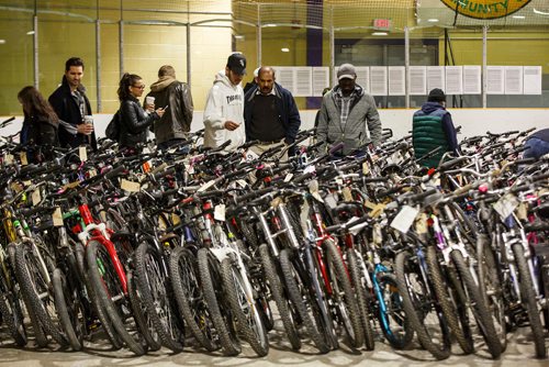MIKE DEAL / WINNIPEG FREE PRESS
Prospective bidders check out bikes before they go up for auction.
About 650 bikes will go up for auction during the two-day annual City of Winnipeg bike sale at the Terry Sawchuck Arena, 901 Kimberly Ave. 
190427 - Saturday, April 27, 2019.