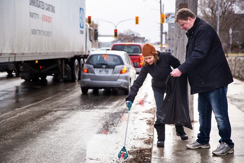 MIKAELA MACKENZIE/WINNIPEG FREE PRESS
Cheryl Roney picks up garbage with columnist Doug Speirs at Winnipeg BIZ's 14th annual Earth Day Cleanup in Winnipeg on Monday, April 29, 2019. 
Winnipeg Free Press 2019