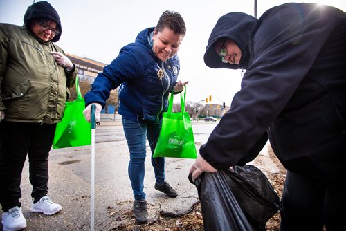 MIKAELA MACKENZIE/WINNIPEG FREE PRESS
Melanie Beardy (left), Priscilla Bone, and Maxine Desjarlais pick up garbage Winnipeg BIZ's 14th annual Earth Day Cleanup in Winnipeg on Monday, April 29, 2019. 
Winnipeg Free Press 2019