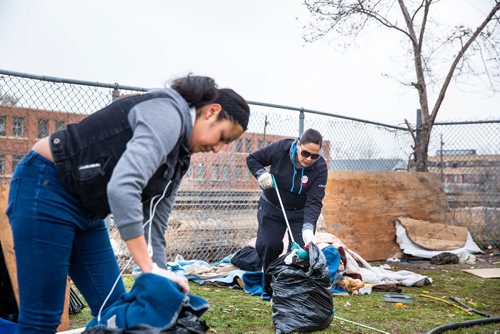 MIKAELA MACKENZIE/WINNIPEG FREE PRESS
Malayan Owen (left) and Marcy Abraham, from the Aboriginal Community Campus, pick up garbage at Winnipeg BIZ's 14th annual Earth Day Cleanup in Winnipeg on Monday, April 29, 2019. 
Winnipeg Free Press 2019