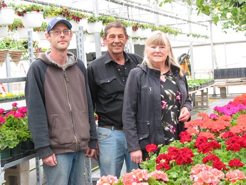 Canstar Community News April 23, 2019 - (From left) Chris, Marcel and Sandra Leclerc are shown in the family's greenhouse at 7014 Assiniboine Ave. in Headingley. (ANDREA GEARY/CANSTAR COMMUNITY NEWS)