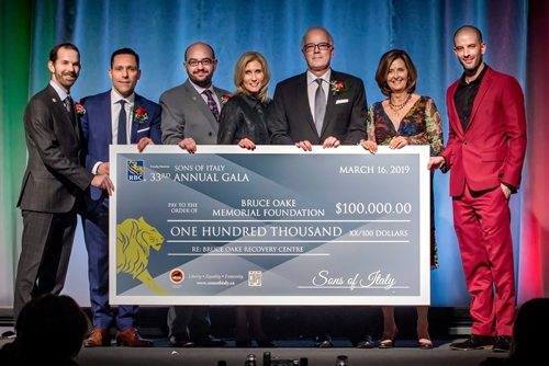 SUBMITTED PHOTO / MIREK WEICHSEL & JOHN GIAVEDONI

L-R: Travis Giavedoni (Sons of Italy treasurer), Mario Posillipo (Sons of Italy gala chair), Dino Petrelli (Sons of Italy president), Kim Ulmer (RBC Royal Bank regional president), Scott Oake (Bruce Oake Foundation), Susan Millican (gala honourary co-chair) and Darcy Oake (illusionist and gala entertainer) hold a $100,000 donation cheque for the Bruce Oake Recovery Centre from the Sons of Italy at the 33rd Annual Sons of Italy Garibaldi Lodge Gala on March 16, 2019 at the RBC Convention Centre Winnipeg. (See Social Page)